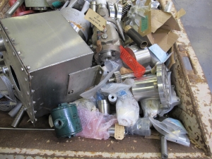 SCRAPPERS DELIGHT! FULL SKIFF STACKED WITH MISC. STAINLESS STEEL, BRASS, BRONZE, AND HEAVY STEEL. SKIFF NOT INCLUDED. LOADING & HANDLING FEE $30-4617